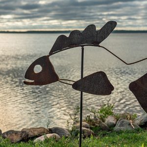 Wally, Water's Edge Metal Art metal fish sculpture on lake shore